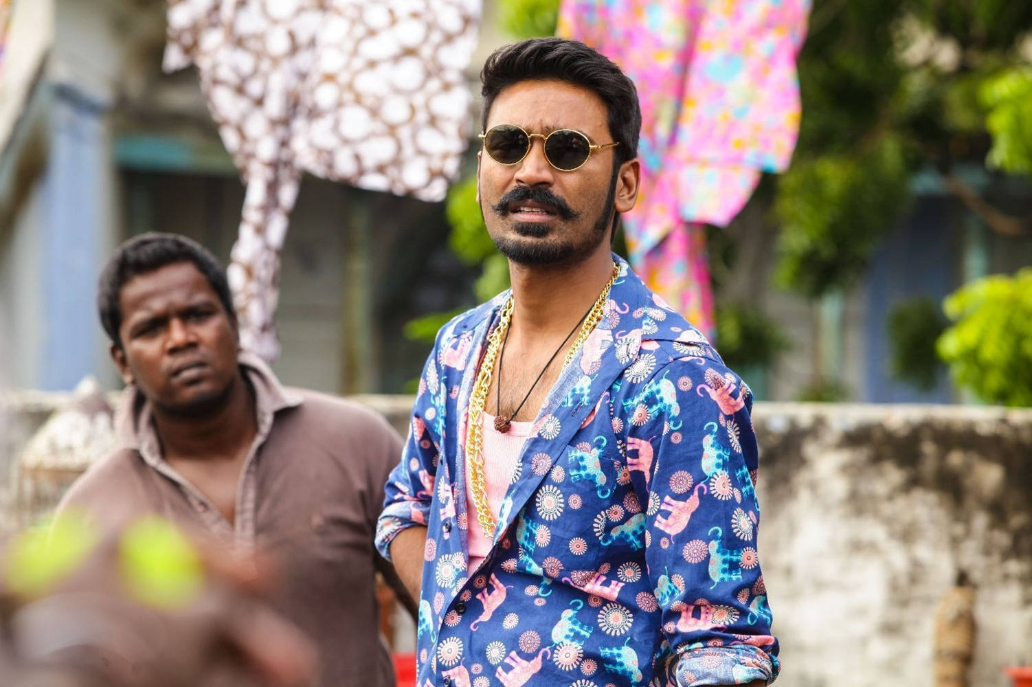 Dynamic Indian Star Artist Dhanush Wallpaper