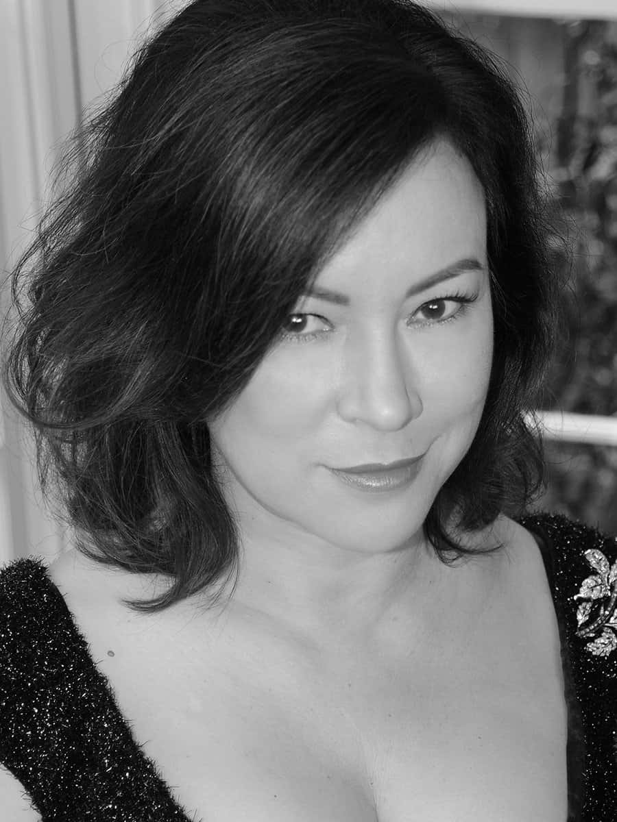 Elegant Blackand White Portraitof Jennifer Tilly Wallpaper