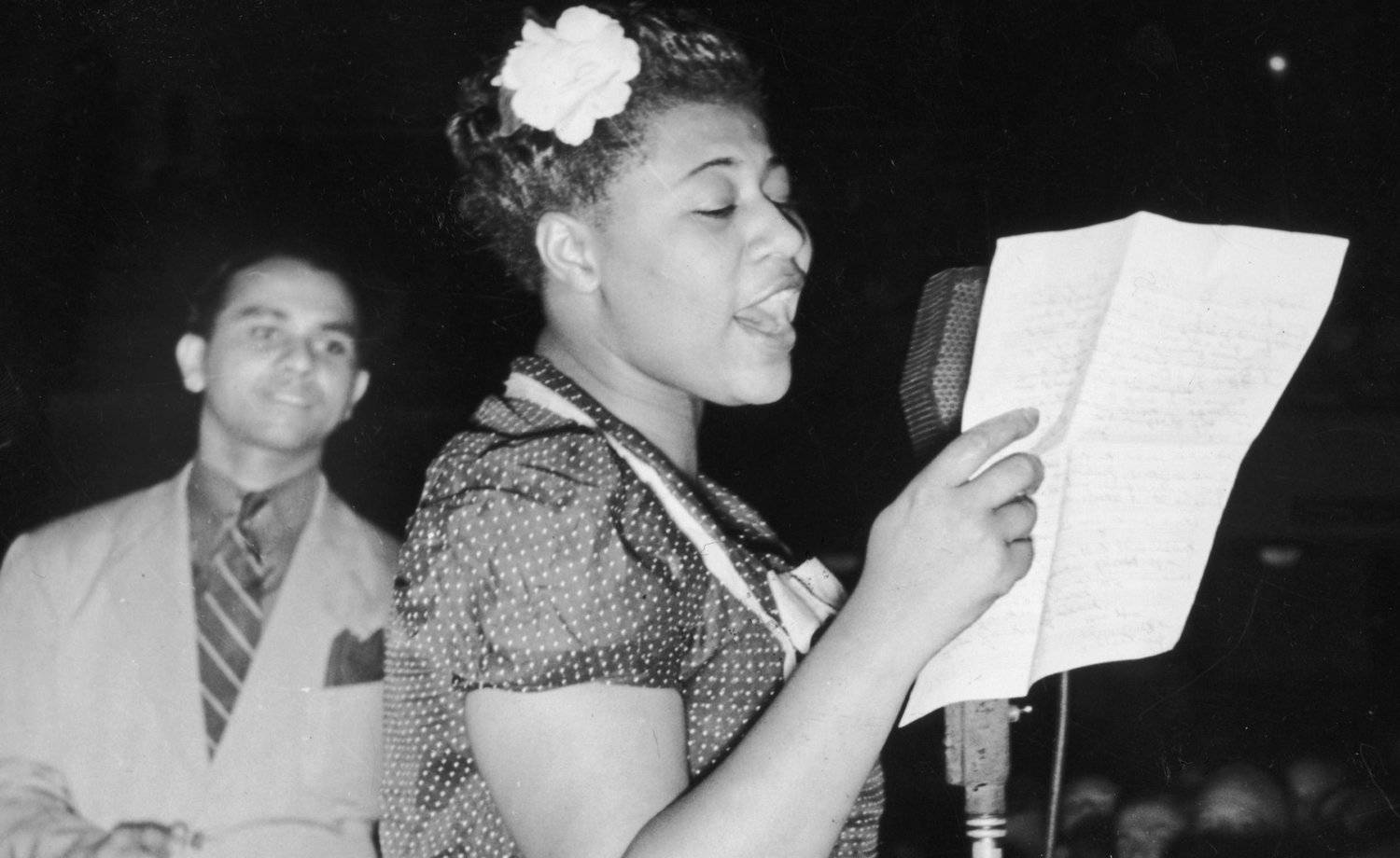 Ella Fitzgerald Holding A Paper Wallpaper