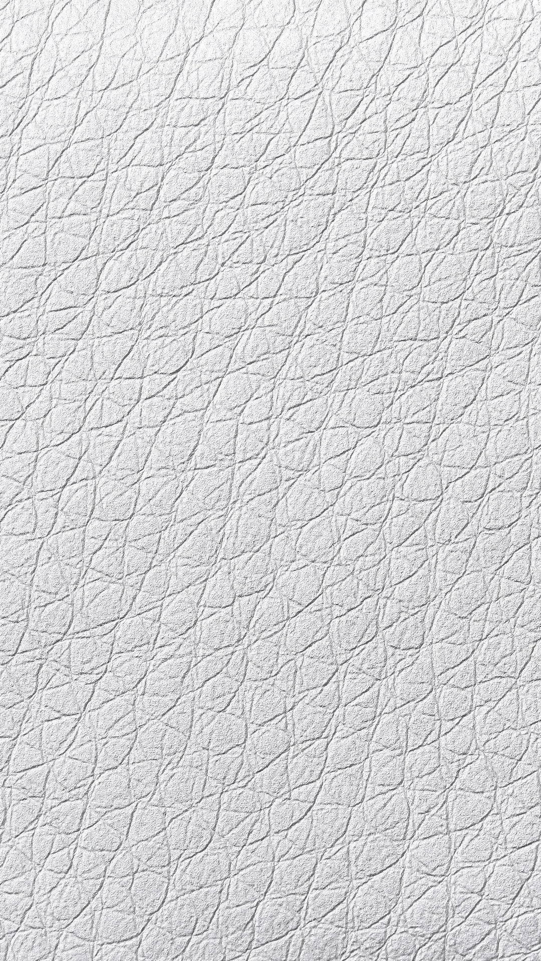 Engaging White Iphone Displaying Unique Texture Wallpaper