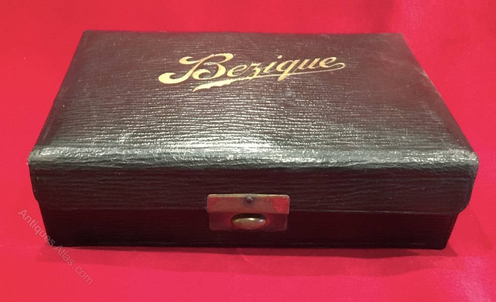 Enthralling Bezique Card Game In A Sleek Black Box. Wallpaper