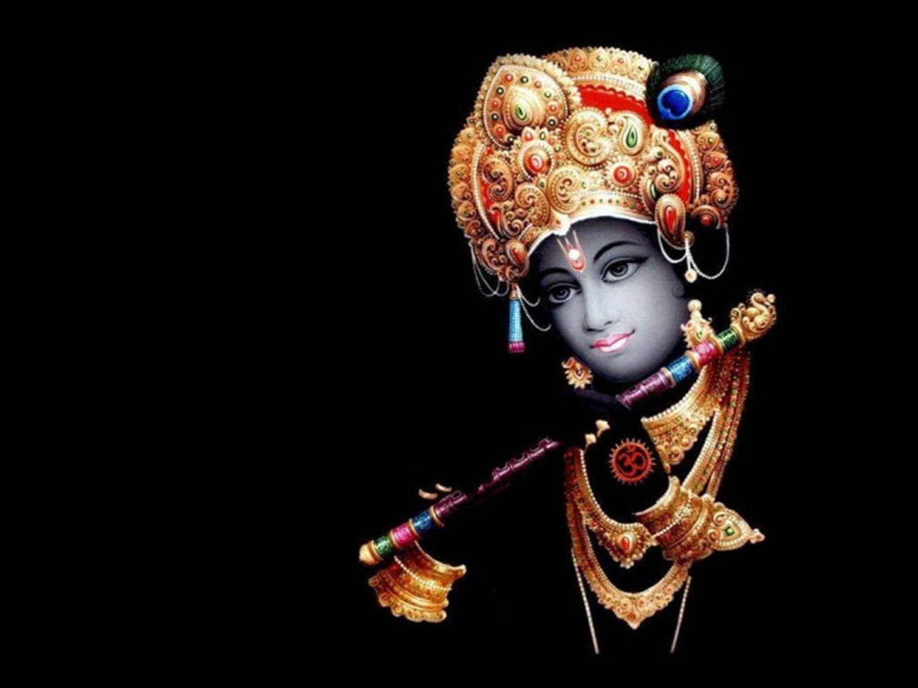 Exquisite Krishna Statue Celebrating Janmashtami Wallpaper