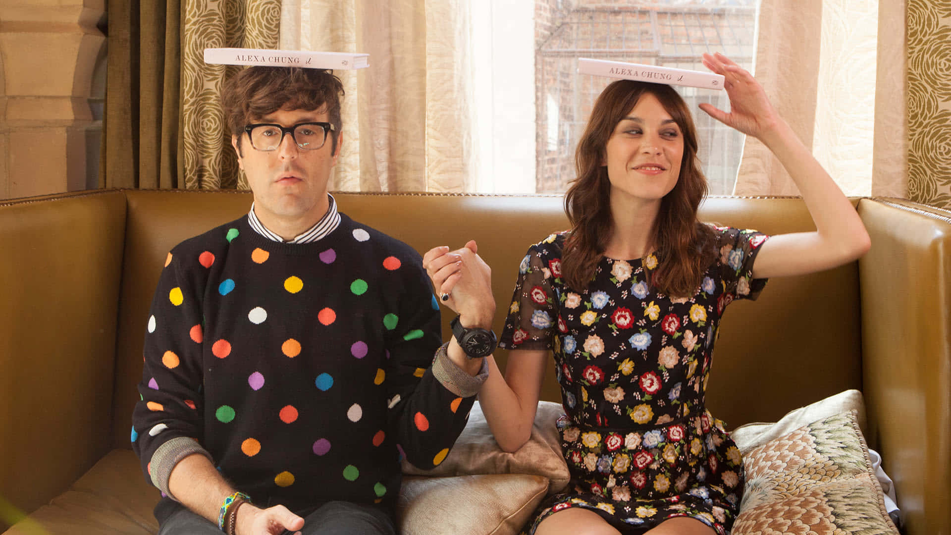 Fashion Icon Alexa Chung Posing Stylishly At An Event Wallpaper