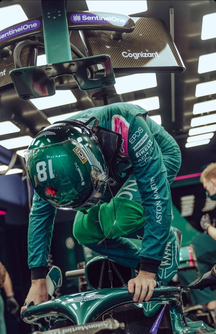 Formula 1 Driver, Lance Stroll Gearing Up To Take A Ride In His Racing Car. Wallpaper