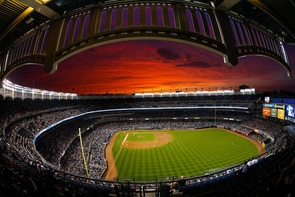 Full House Yankee Stadium At Dusk Wallpaper