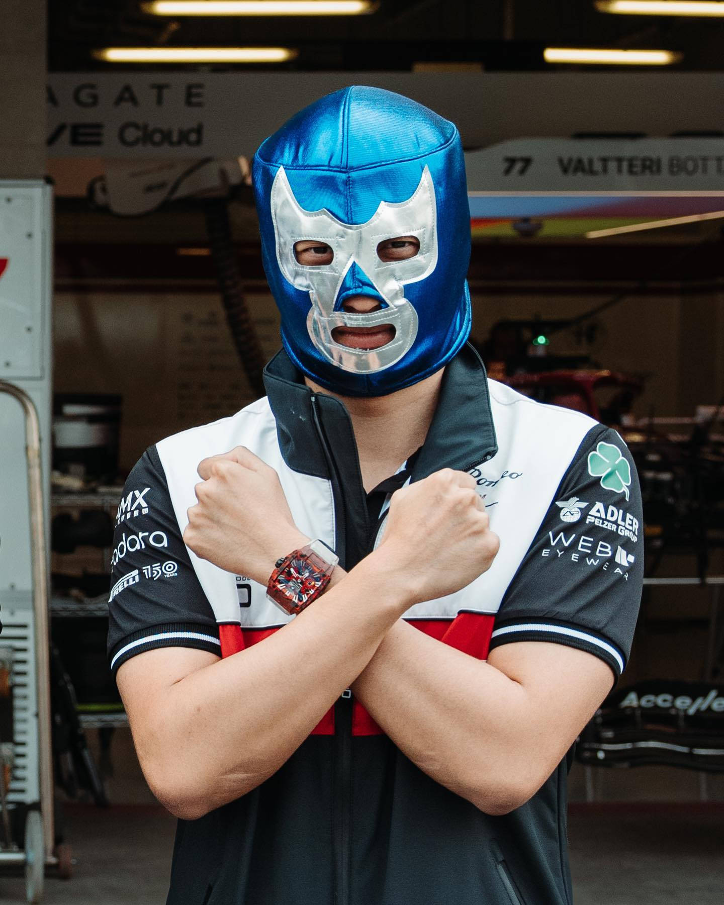 Guanyu Zhou Wearing A Funny Mask Wallpaper