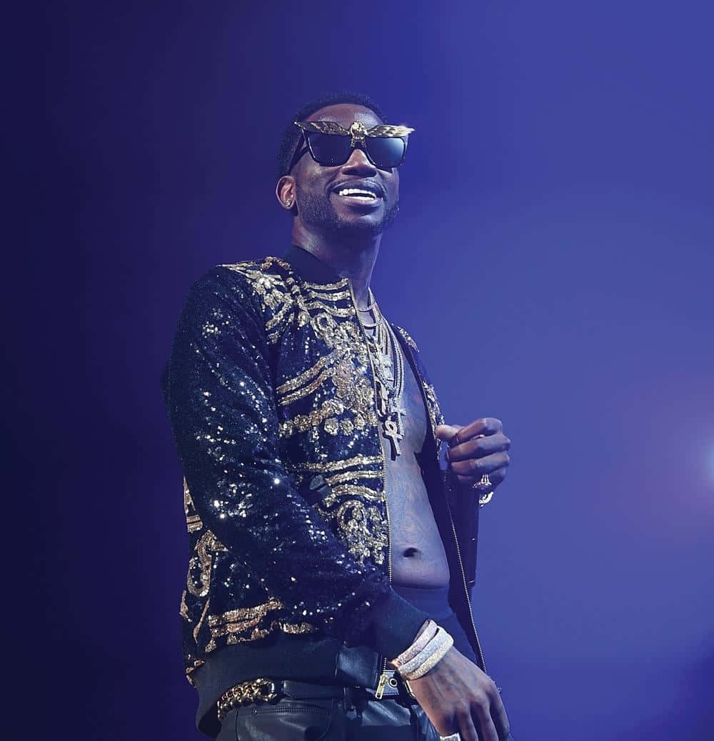 Gucci Mane Performingon Stage Wallpaper