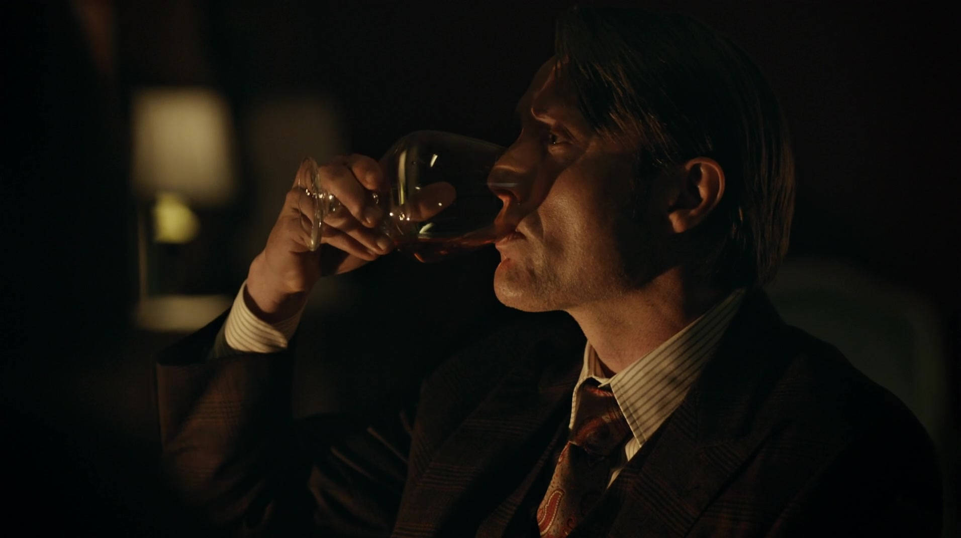 Hannibal Lecter With A Glass Of Fine Wine Wallpaper