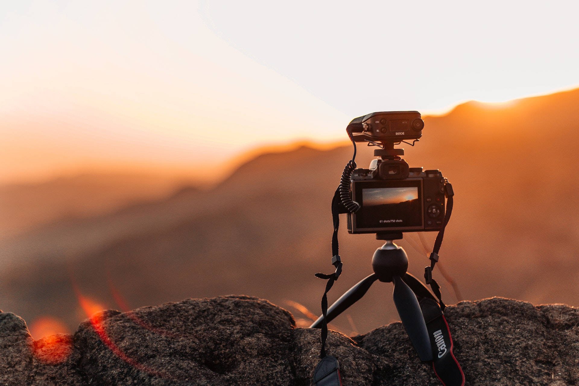 Hd Camera Mounted On A Tripod Wallpaper