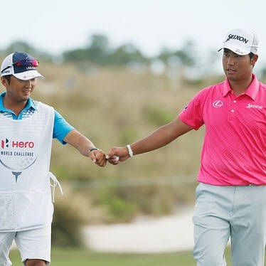 Hideki Matsuyama Fist Bumping Caddie Wallpaper