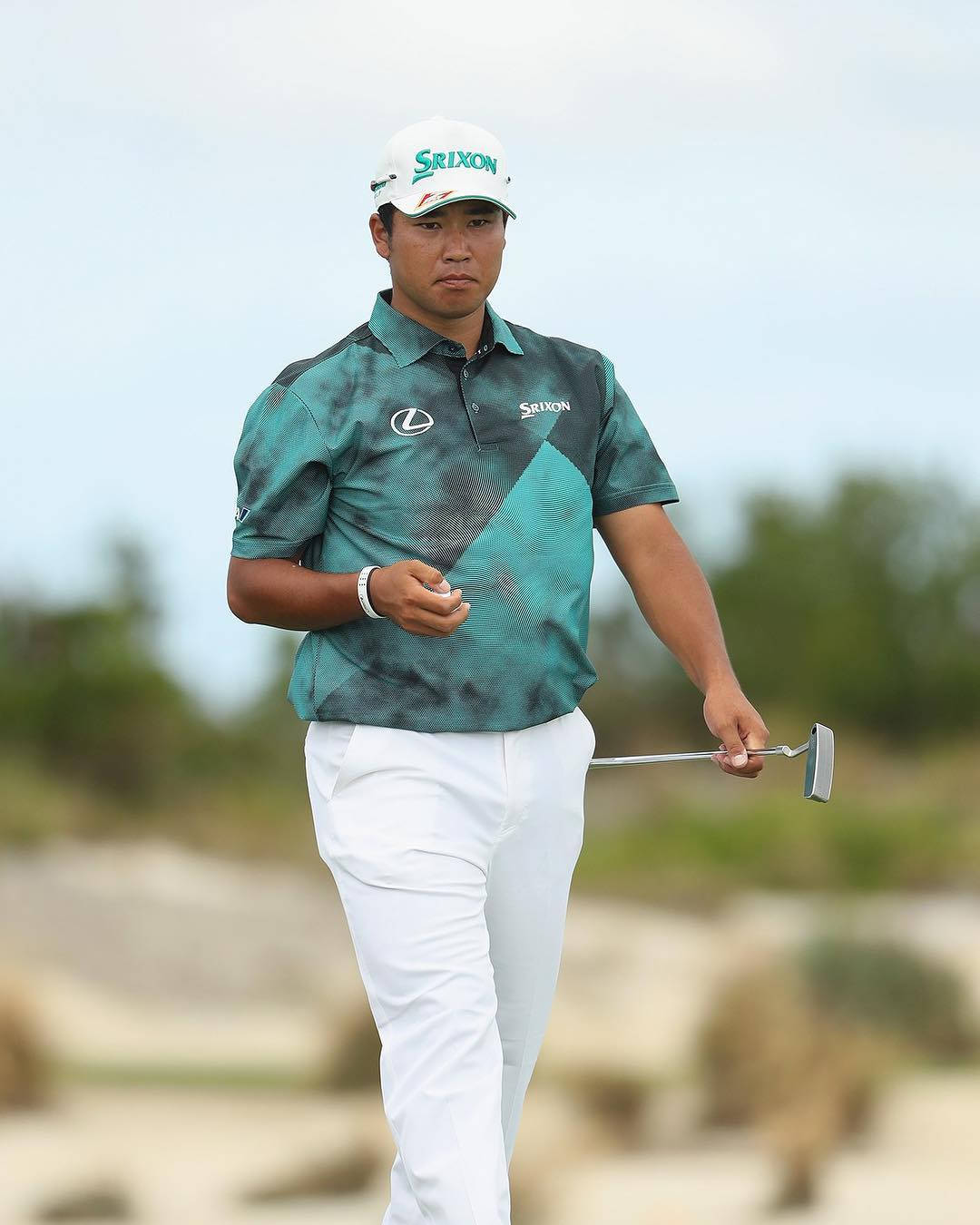 Hideki Matsuyama Wearing Printed Green Shirt Wallpaper