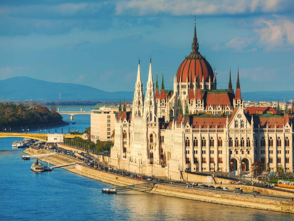 Hungary's Parliament Building Is Seen From The River Wallpaper