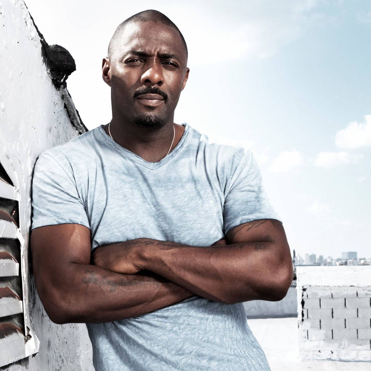 Idris Elba Arms Crossed Wallpaper