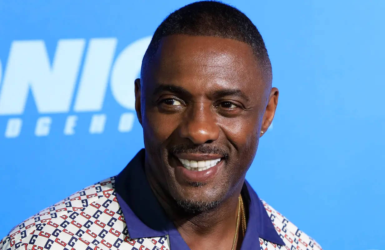 Idris Elba In Printed Polo Shirt Wallpaper