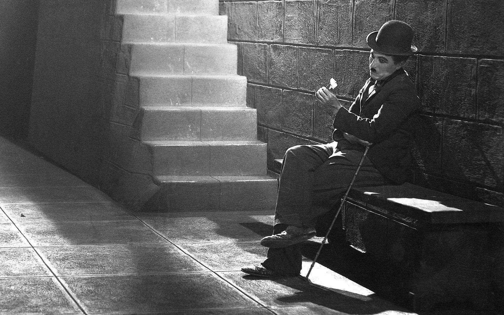 Image Charlie Chaplin In A Sad And Reflective Portrait Wallpaper