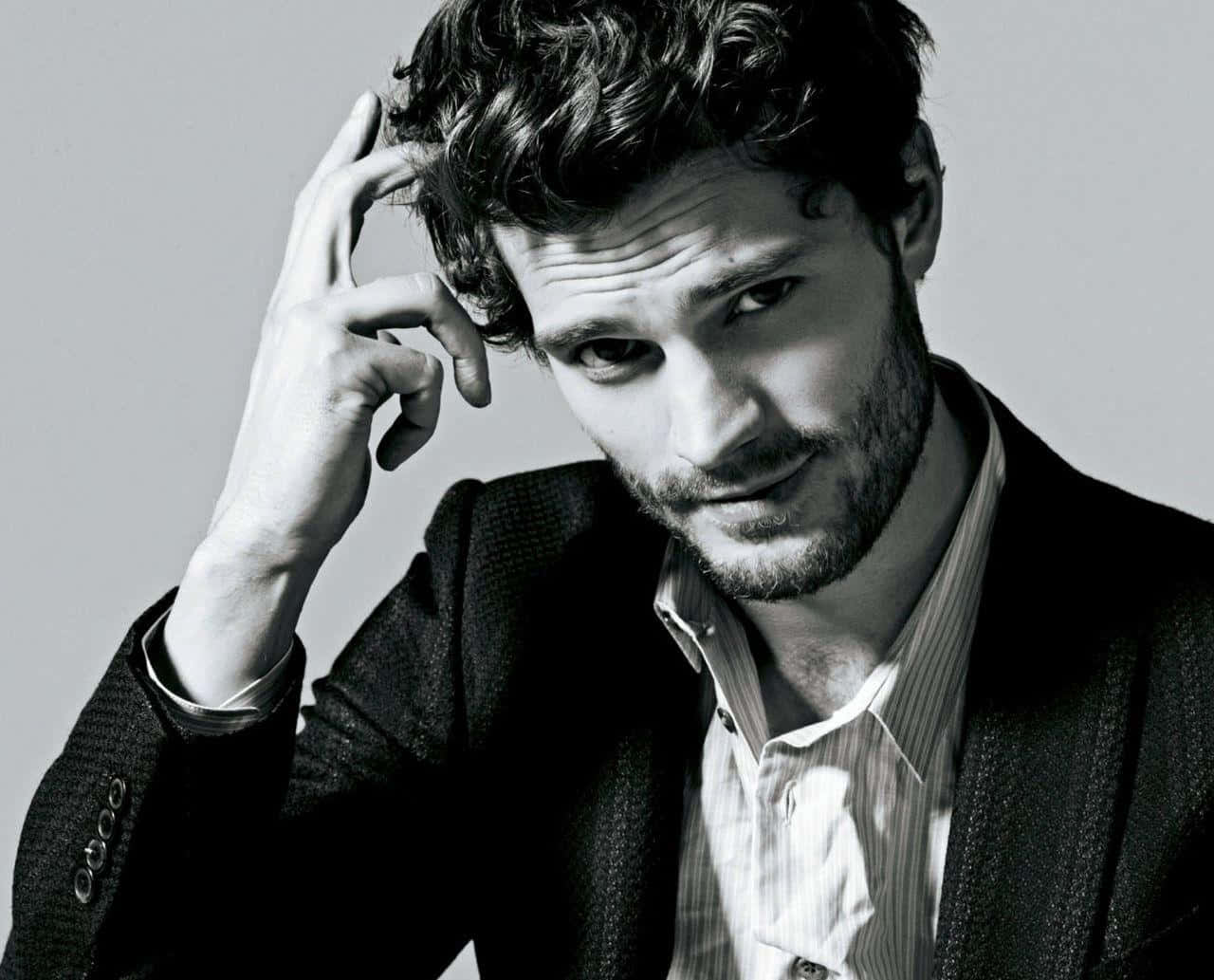 Jamie Dornan Looking Dapper In A Suit Wallpaper