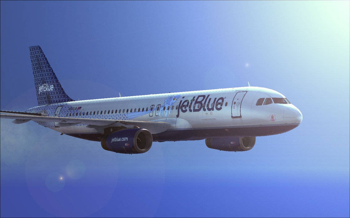 Jetblue Airways Plane In The Sunlight Wallpaper