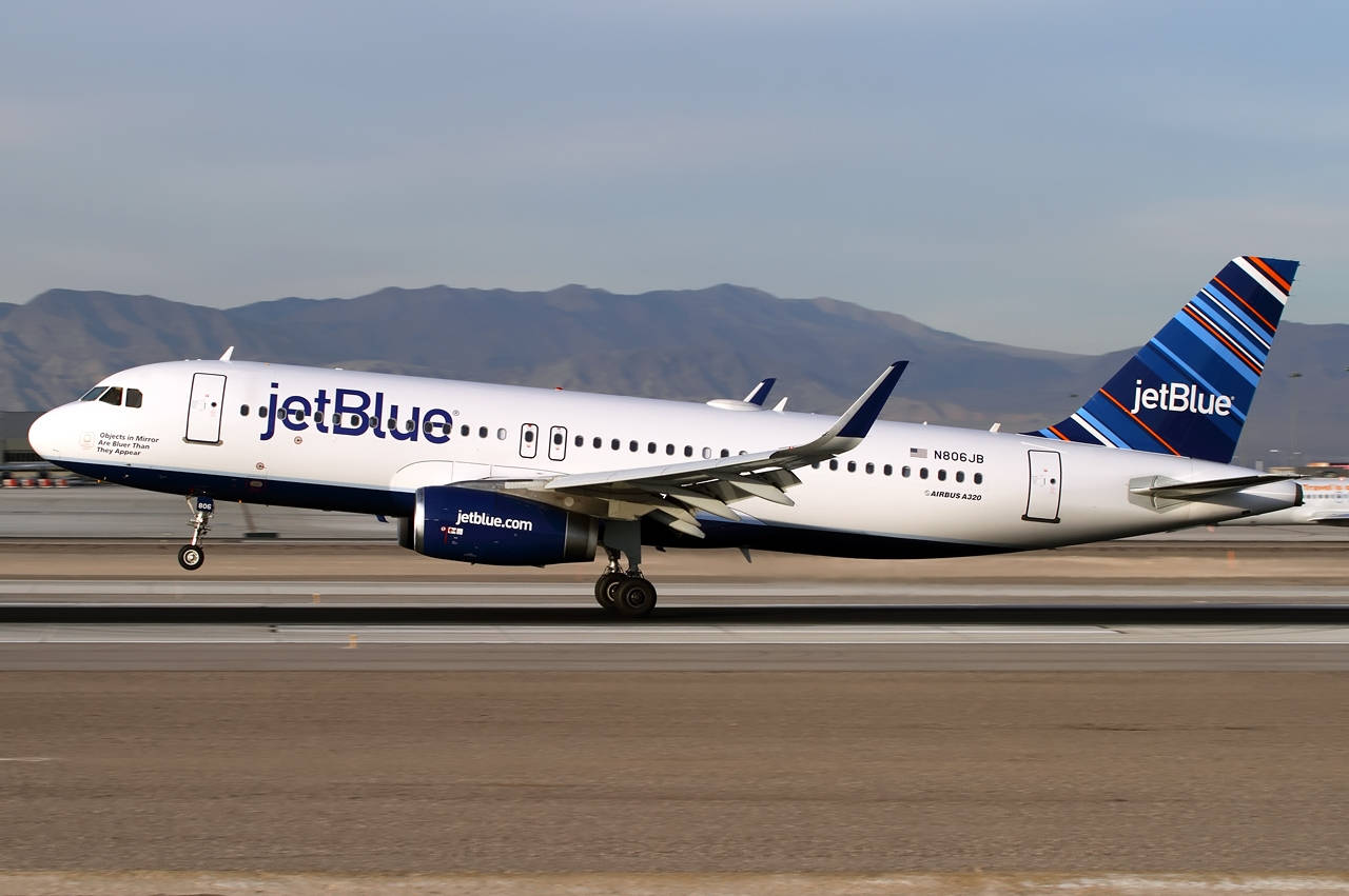 Jetblue Airways Plane On Airport Runway Wallpaper