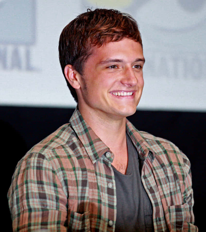 Josh Hutcherson Smiling Plaid Shirt Wallpaper