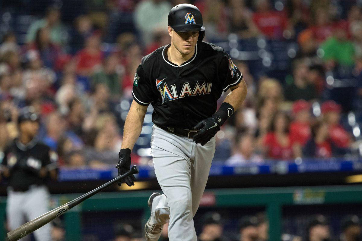 Jt Realmuto Running With Bat Wallpaper