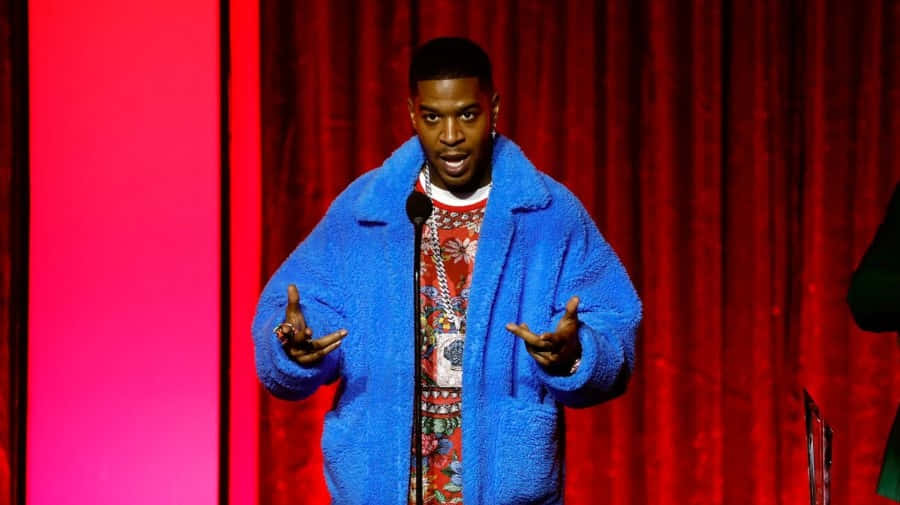 Kid Cudi Blue Coat Performance Wallpaper