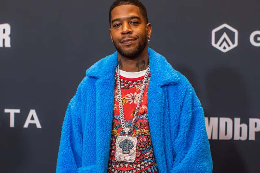 Kid Cudi Blue Fur Coat Event Appearance Wallpaper