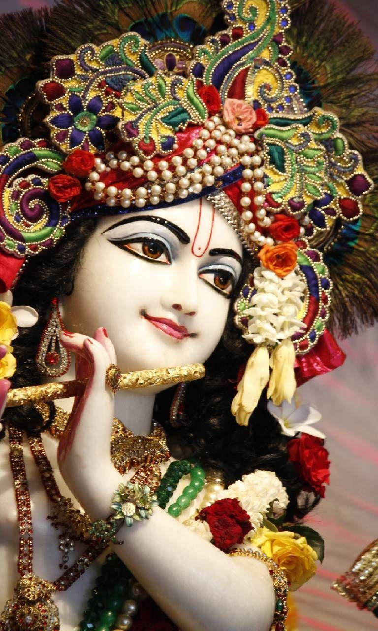 Krishna Bhagwan Statue Smiling Wallpaper