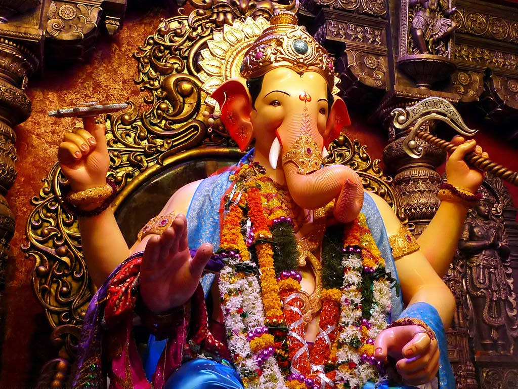 Lalbaugcha Raja Floral Garland Wallpaper