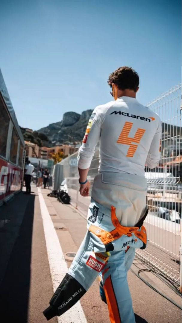 Lando Norris White Racing Suit Wallpaper