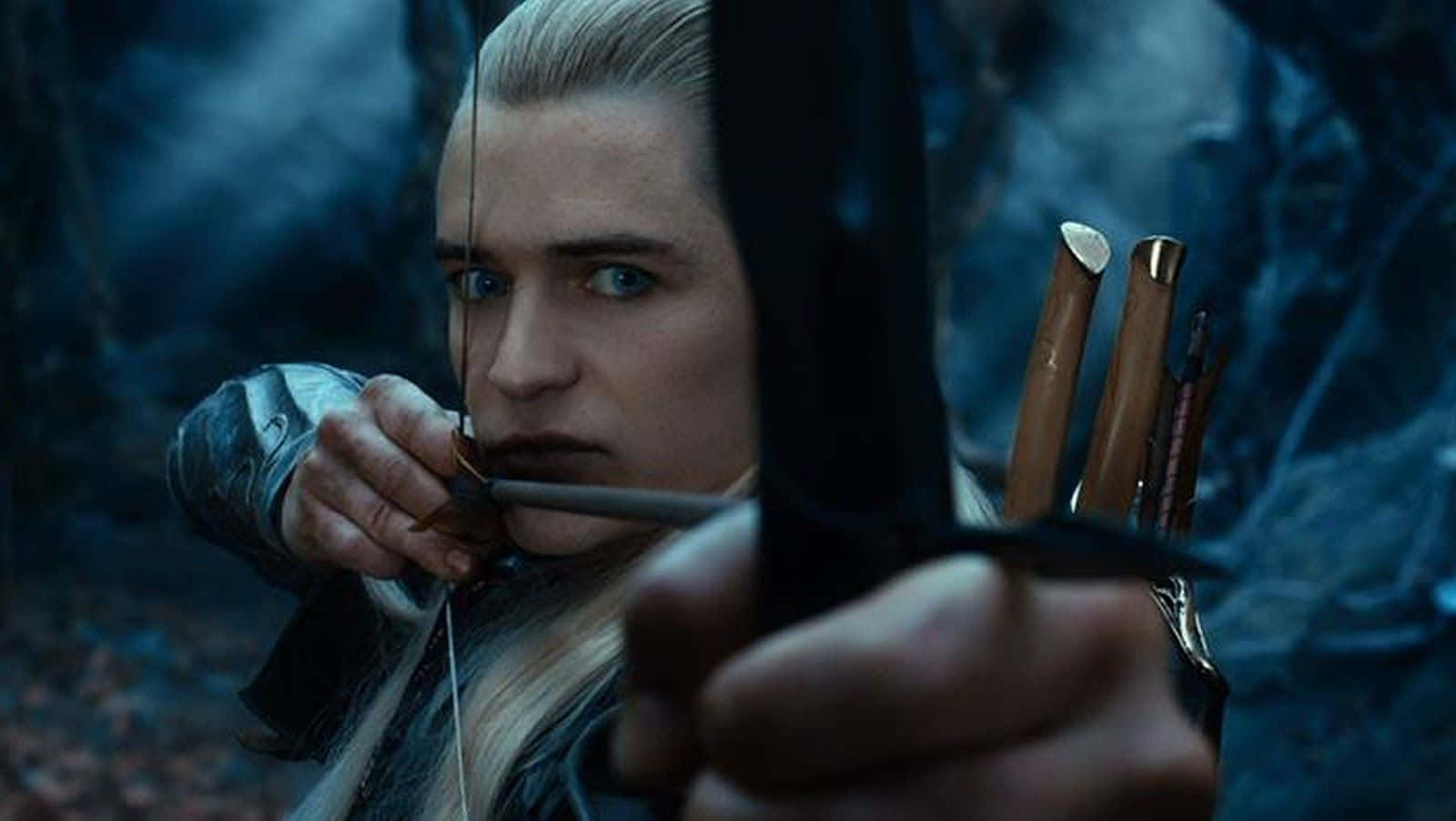 Legolas The Elf Glancing Off Into The Horizon Wallpaper