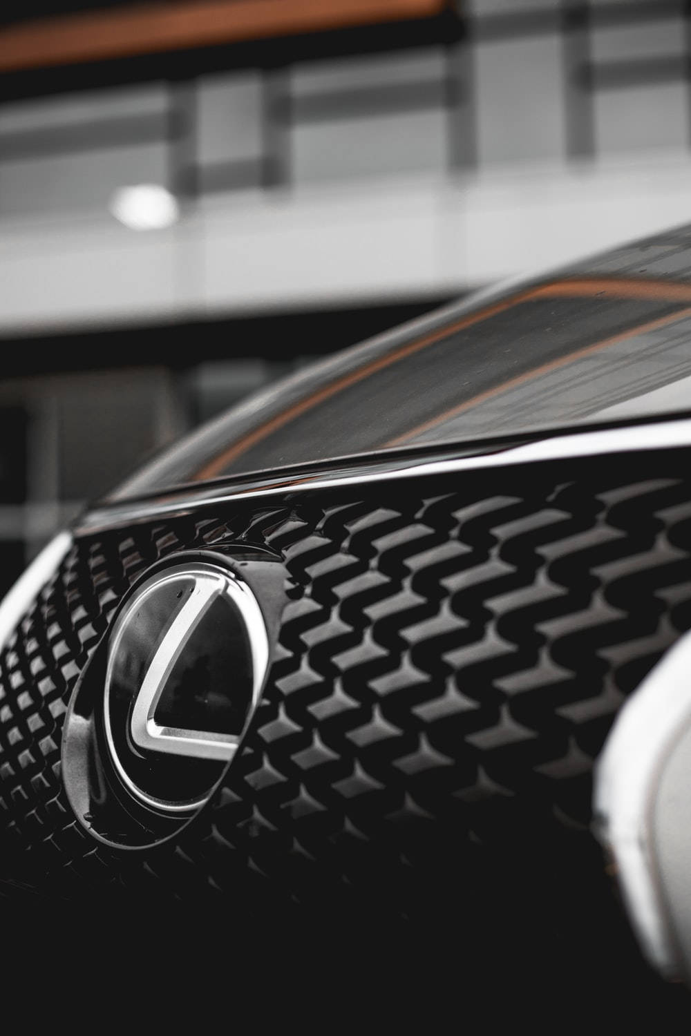 Lexus Logo On Car Grille Wallpaper