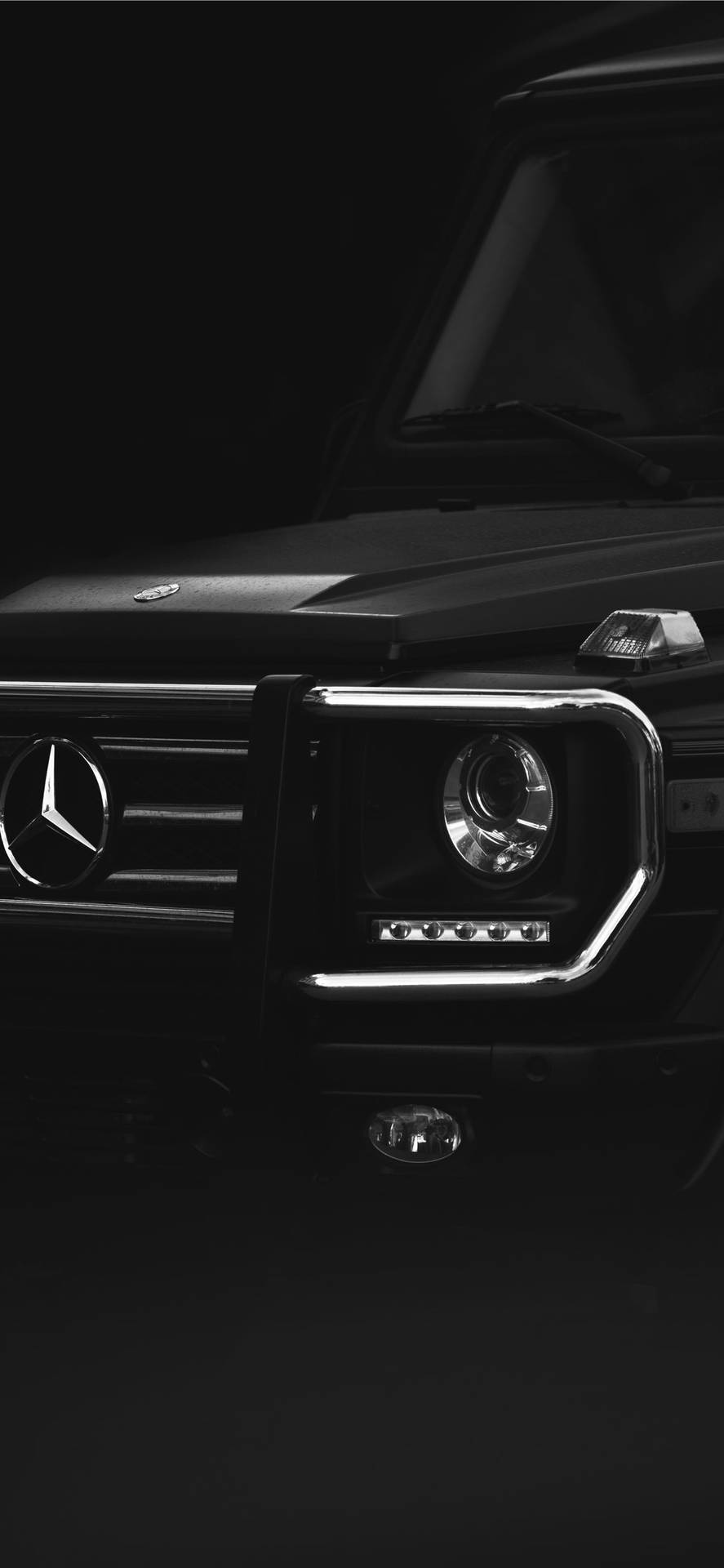 Luxurious Mercedes Benz Car Highlighting Sophisticated Headlight Wallpaper