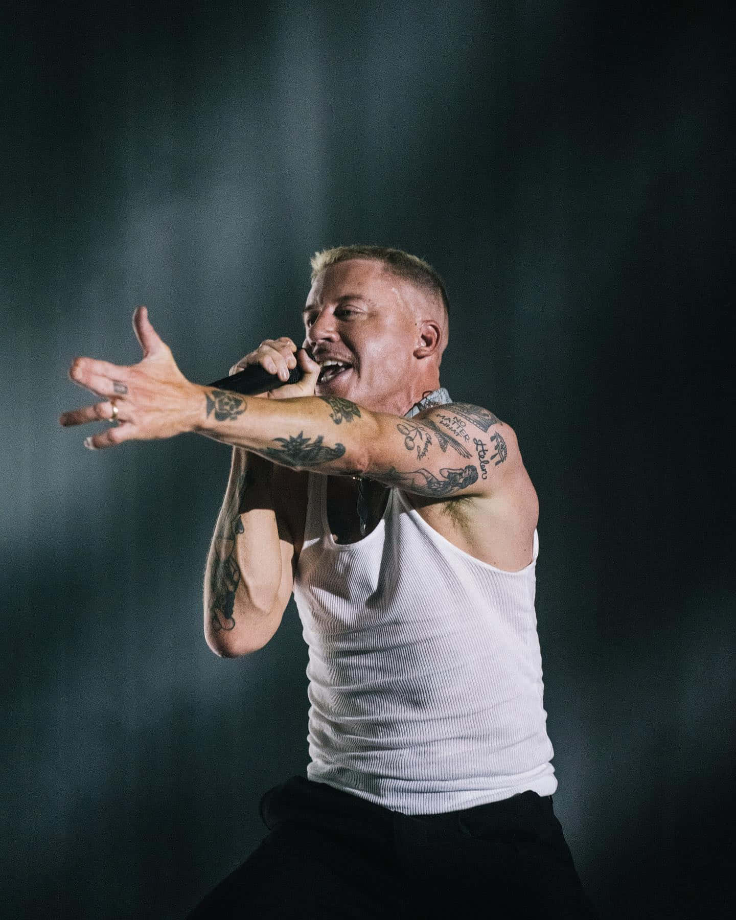 Macklemore Performing Live Onstage.jpg Wallpaper