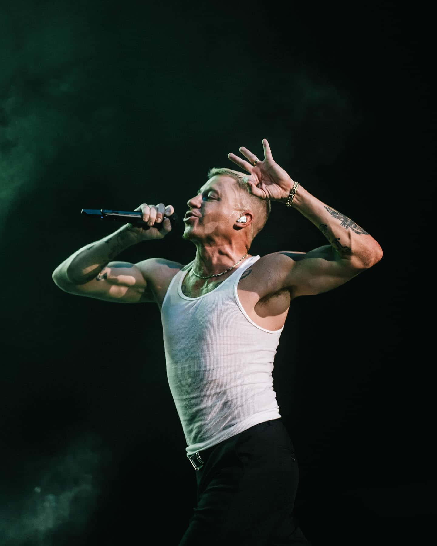 Macklemore Performing Live Onstage.jpg Wallpaper