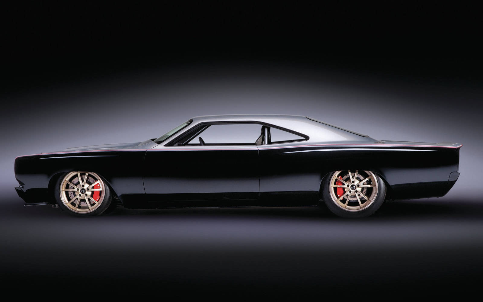 Majestic 1968 Plymouth Road Runner In Sleek Black Wallpaper