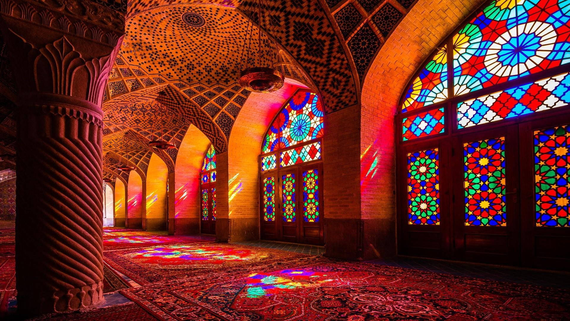 Majestic Mosque Illuminated By Stained Glass Wallpaper