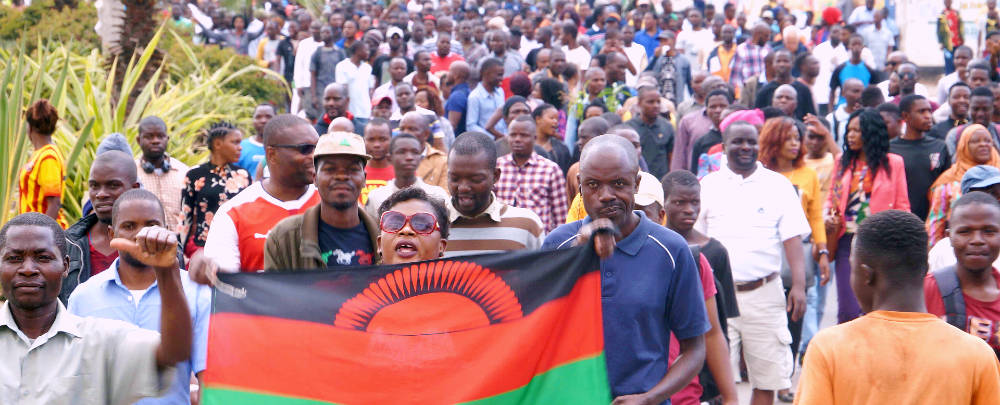 Malawi Supporters Holding Flag Wallpaper