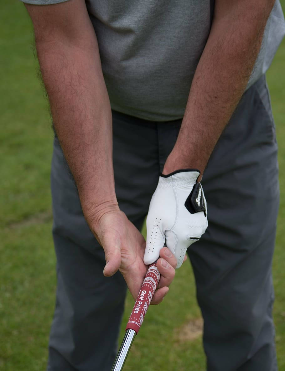 Man Holding A Club Golf Phone Wallpaper