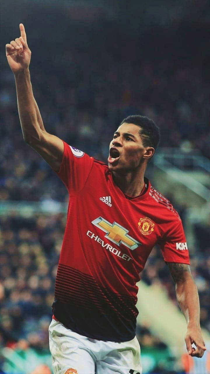 Marcus Rashford Pointing At Sky Wallpaper