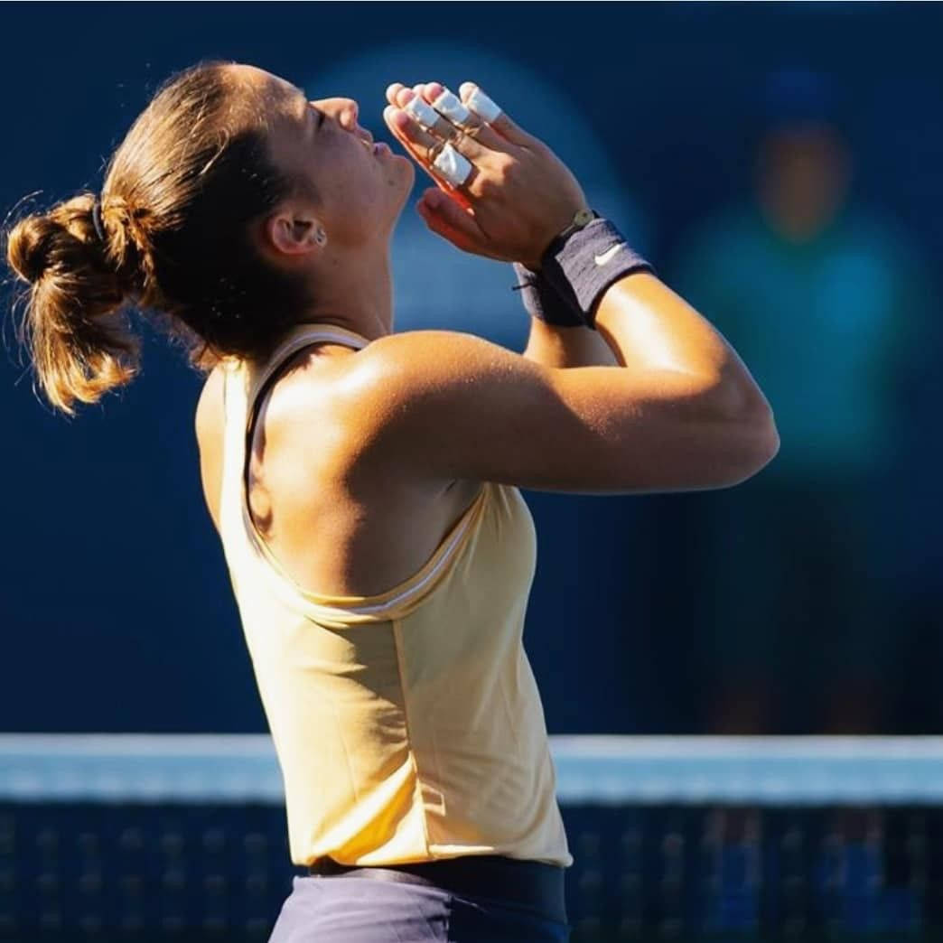 Maria Sakkari Pressing Hands Together During A Match Wallpaper