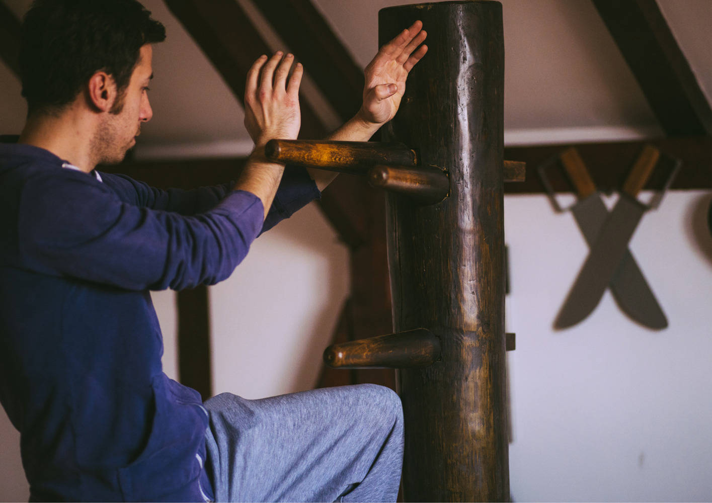 Mastering Wing Chun Through Dummy Practice Wallpaper