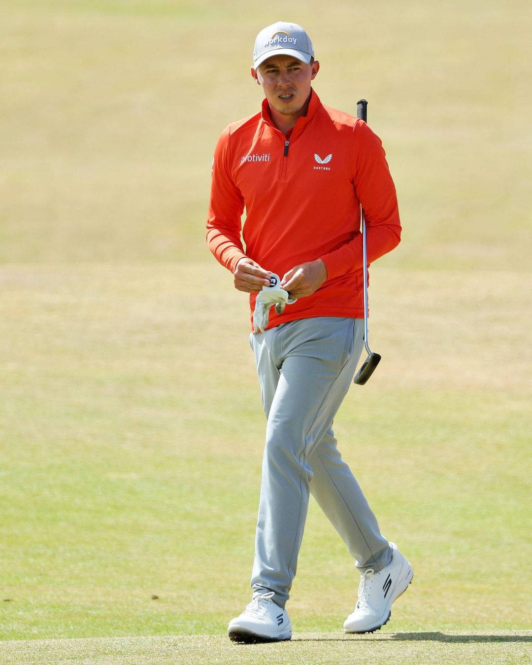 Matt Fitzpatrick Wearing Orange Golf Attire Wallpaper