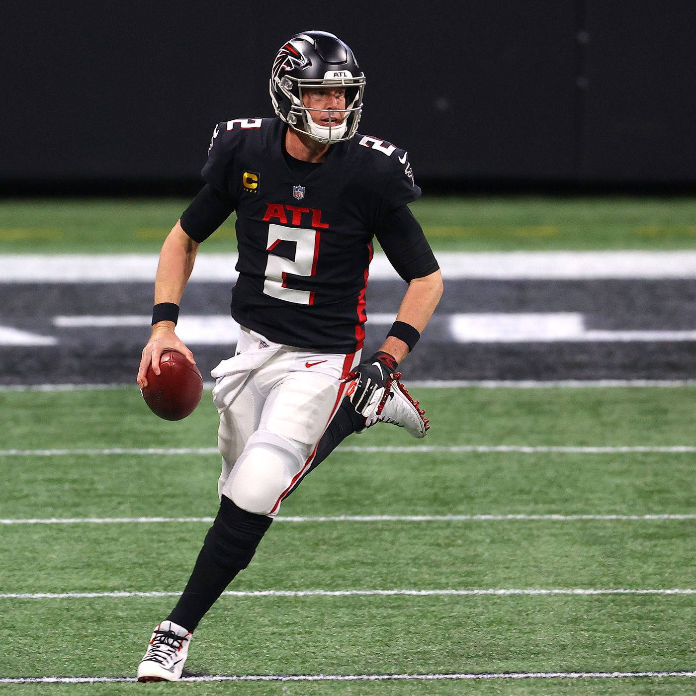 Matt Ryan Running And Holding A Ball Wallpaper