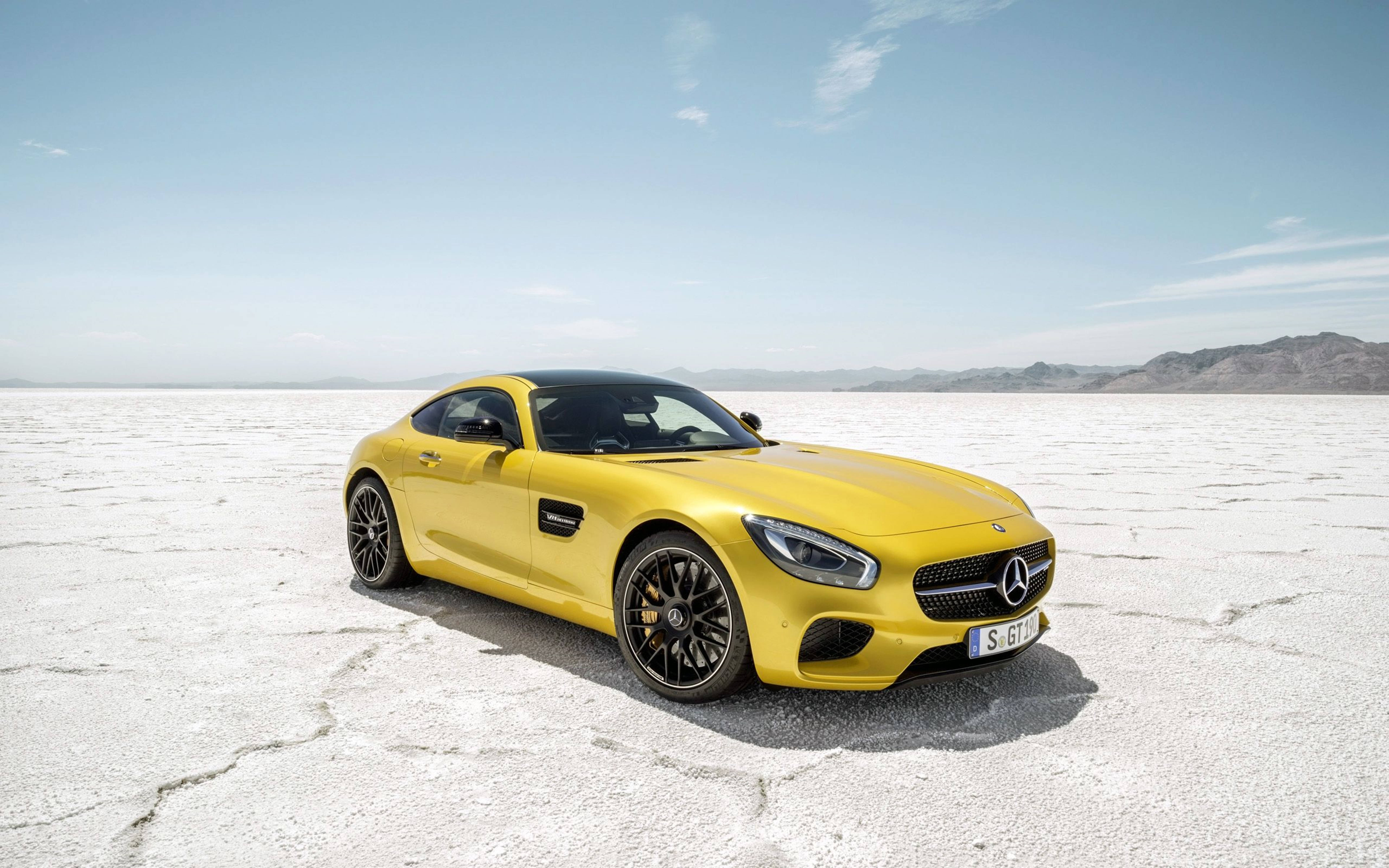 Mercedes Amg 4k Yellow Car On Dry Land Wallpaper