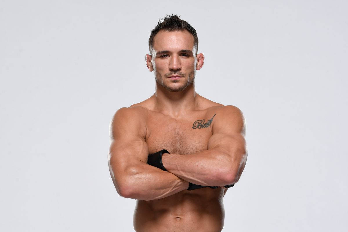 Michael Chandler With Crossed Arms Wallpaper