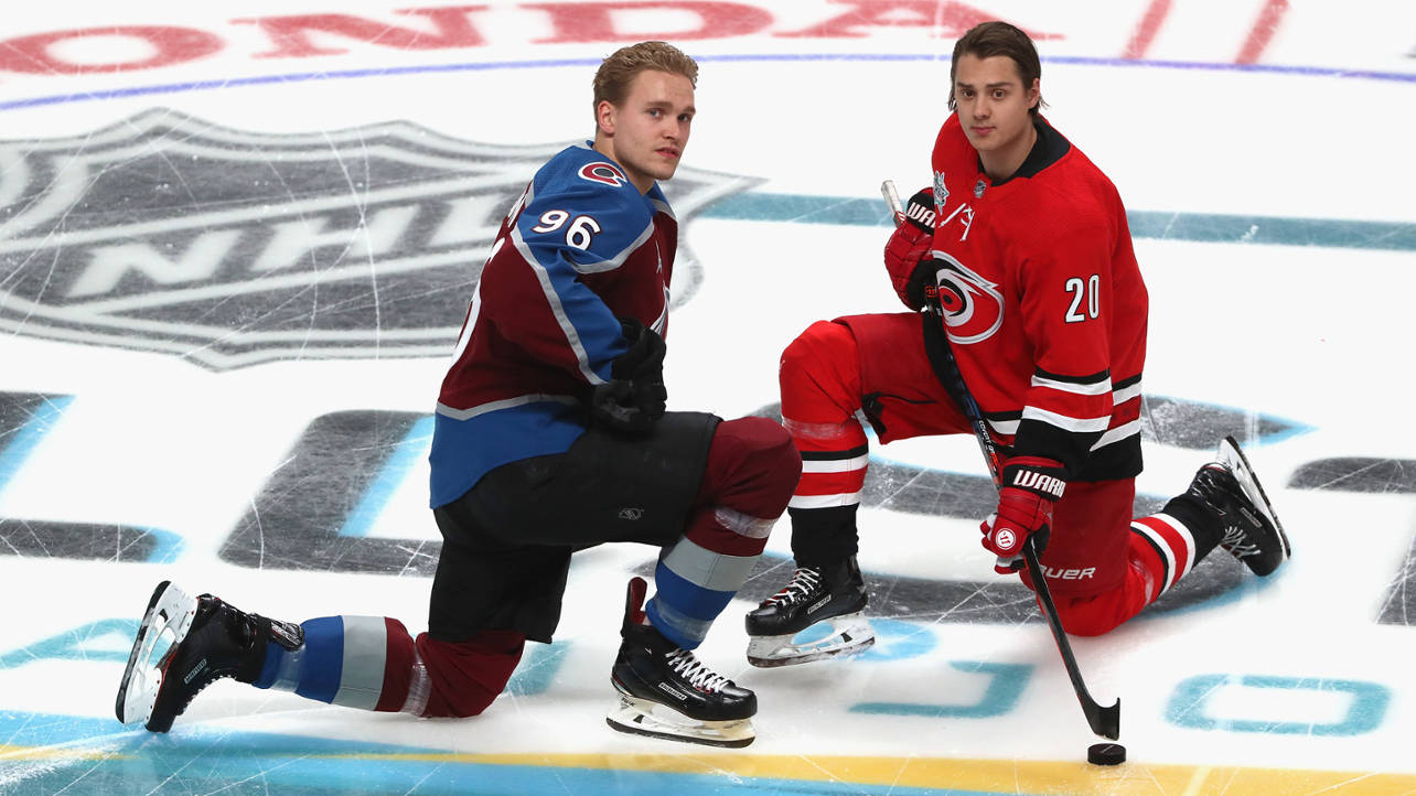 Mikko Rantanen Posing With Sebastian Aho From Carolina Hurricanes Wallpaper