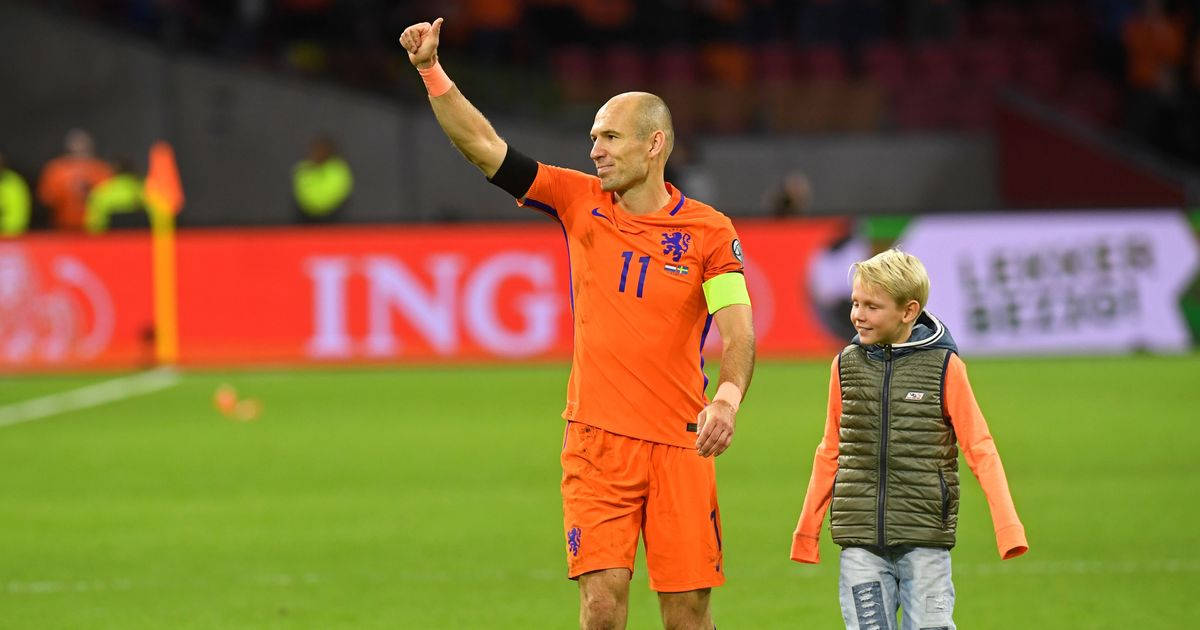 Netherlands National Football Team's Star, Robben, Mentoring A Young Football Aspirant. Wallpaper