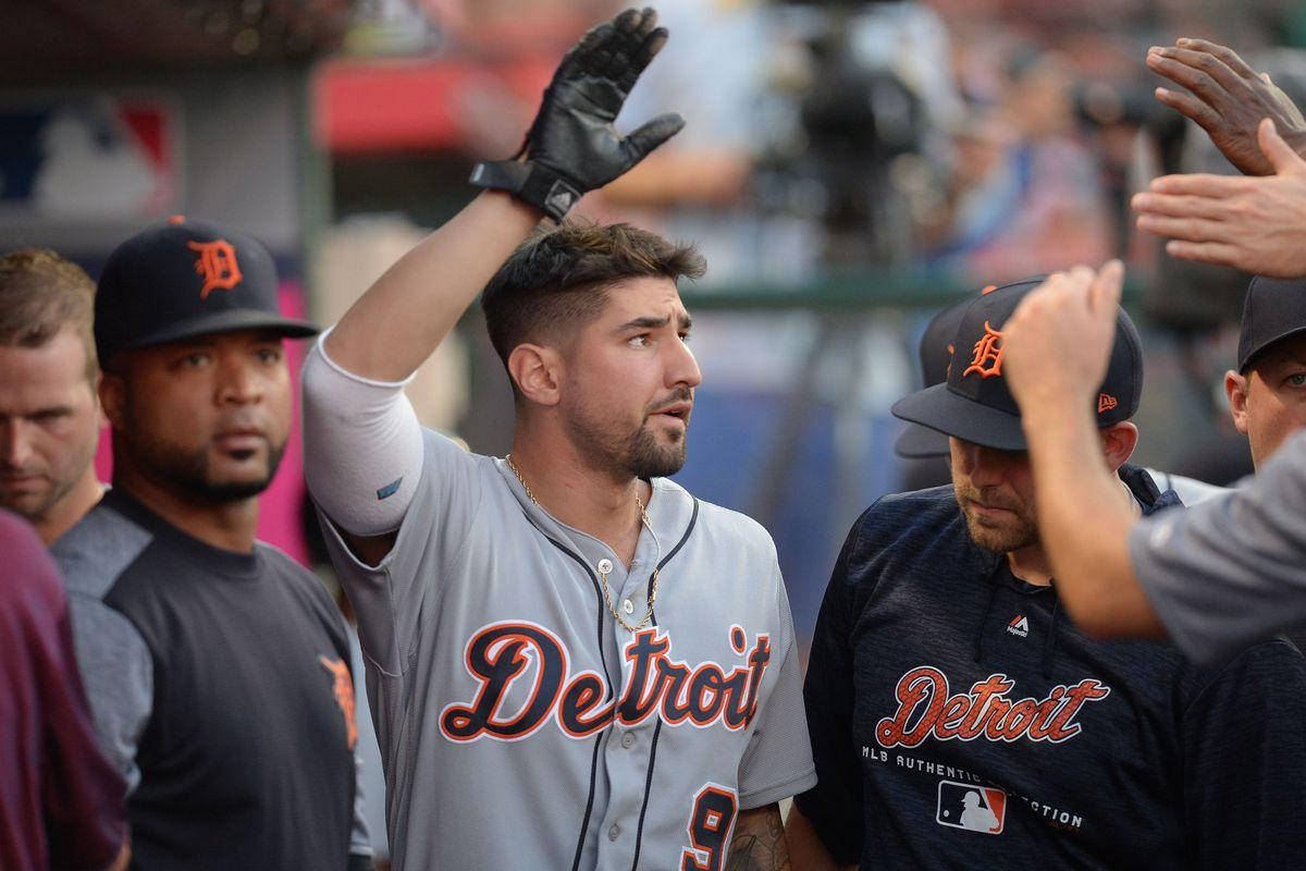 Nick Castellanos Raises A Gloved Hand Wallpaper