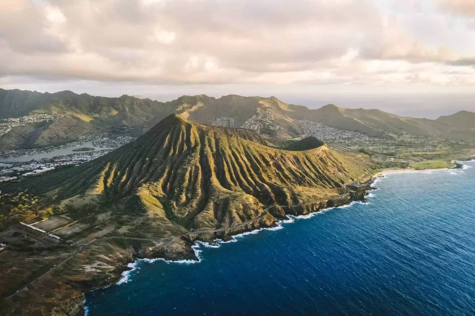 Oahu Volcanic Cone With Blue Sea Wallpaper