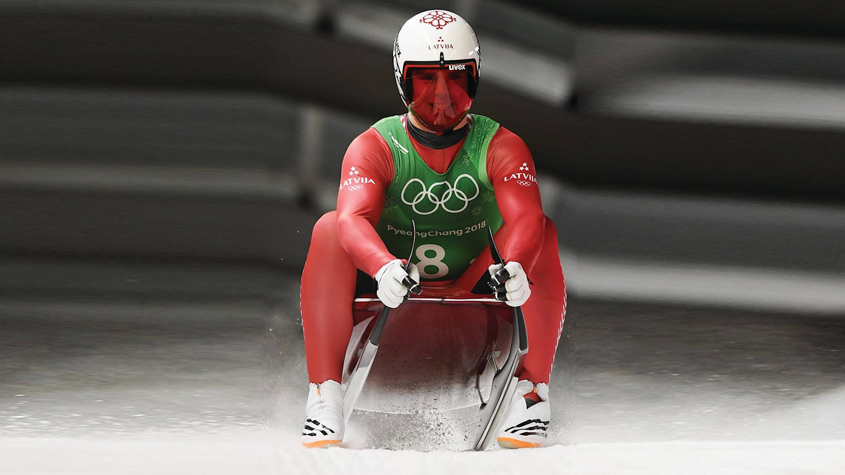 Olympic Luge Athlete In Red Tights Wallpaper